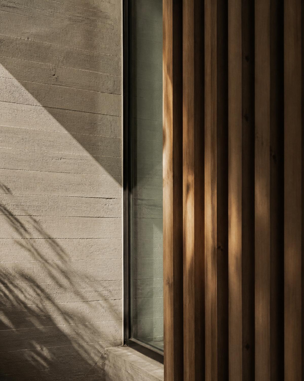 Concrete, timber and glass detail of a contemporary Australian home